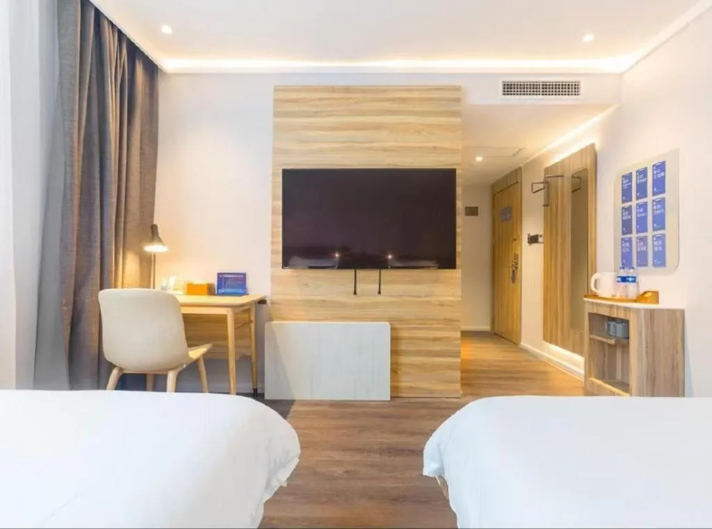 Bed in Hanting Premium Hotel Beijing Wudaokou East Gate of Tsinghua