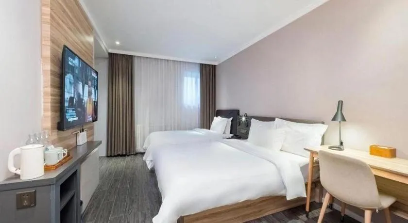 Bed in Hanting Premium Hotel Beijing Wudaokou East Gate of Tsinghua