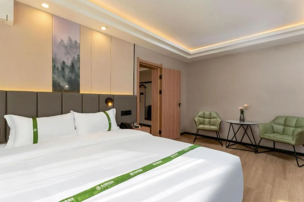 Bed in GreenTree Inn Jinan Quancheng Hotel