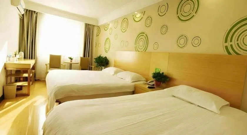 Bed in GreenTree Inn Jinan Quancheng Hotel