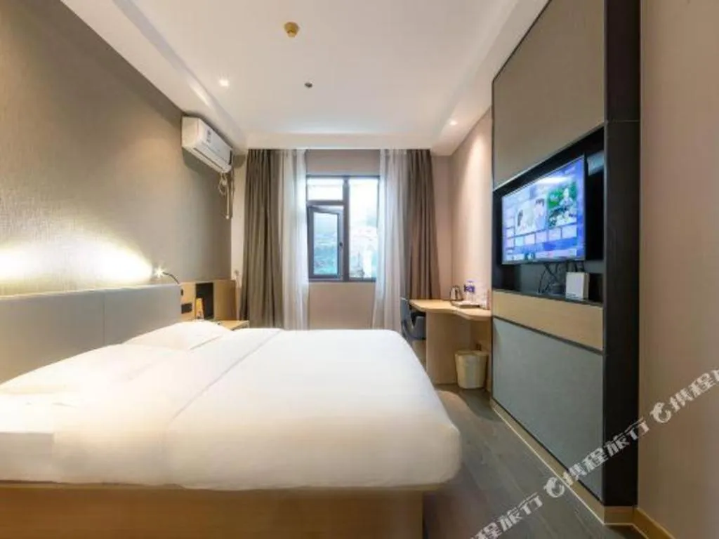 Bed in GreenTree Inn JiangSu NanJing South Railway Station South Square Express Hotel