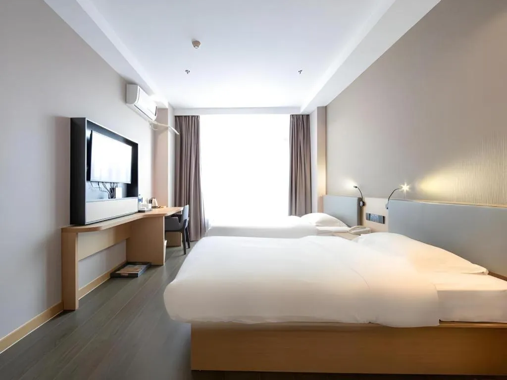 Bed in GreenTree Inn JiangSu NanJing South Railway Station South Square Express Hotel