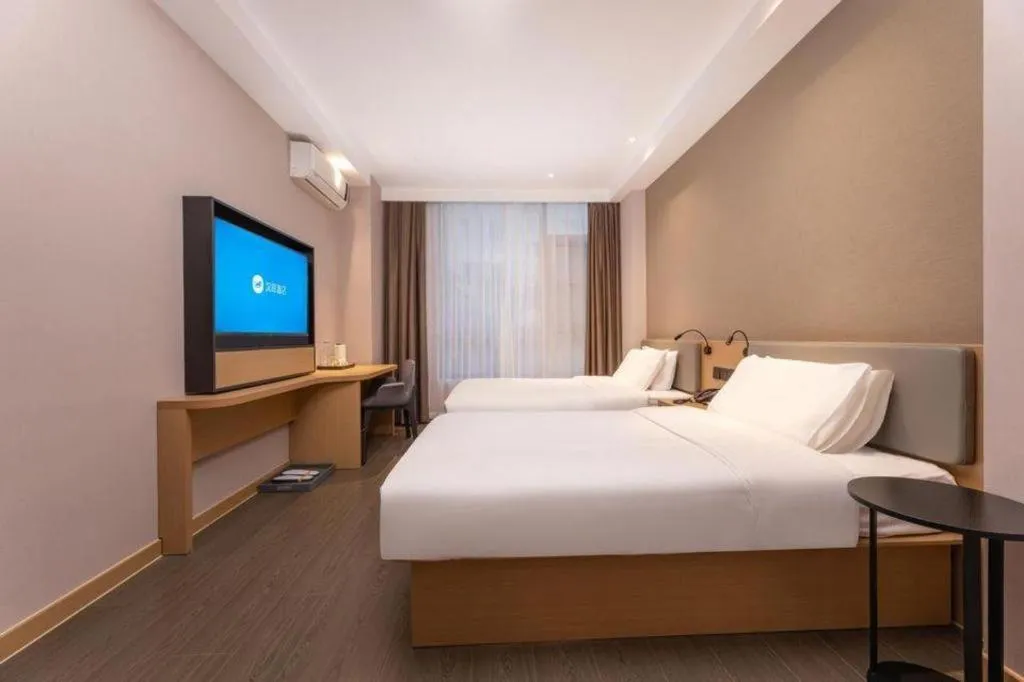 Bed in GreenTree Inn JiangSu NanJing South Railway Station South Square Express Hotel
