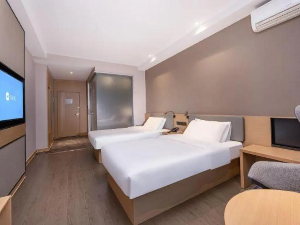 Bed in GreenTree Inn JiangSu NanJing South Railway Station South Square Express Hotel