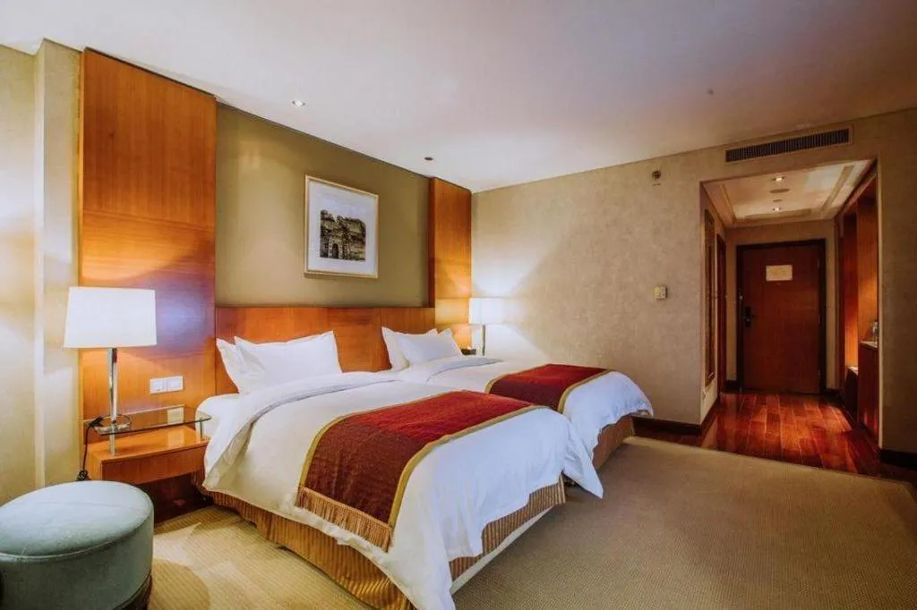 Bed in Shanxi World Trade Hotel