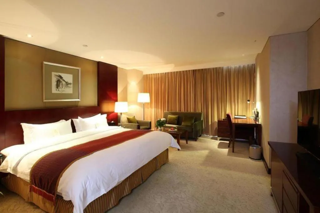 Bed in Shanxi World Trade Hotel