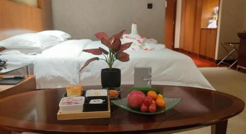 Bed in Shanxi World Trade Hotel