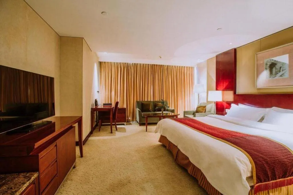 Bed in Shanxi World Trade Hotel