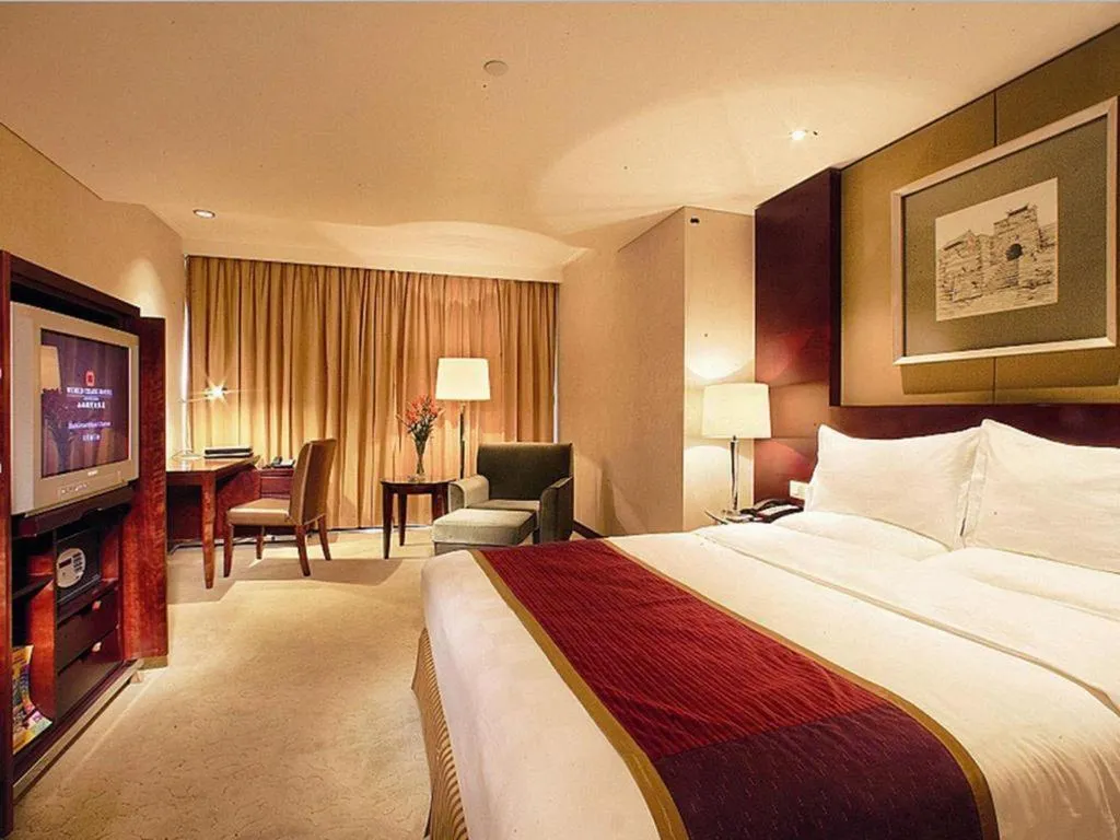 Bed in Shanxi World Trade Hotel