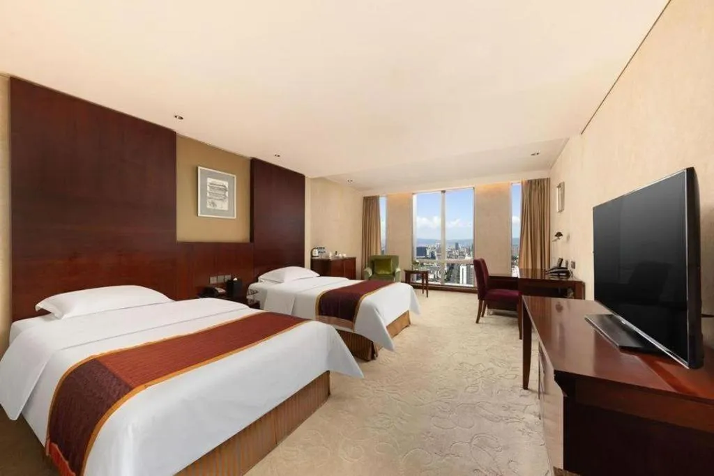 Bed in Shanxi World Trade Hotel