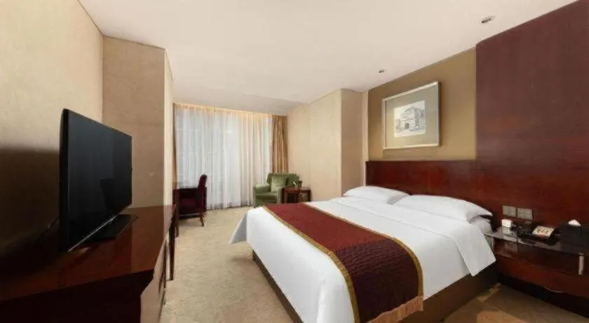 Bed in Shanxi World Trade Hotel