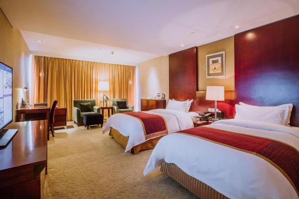 Bed in Shanxi World Trade Hotel