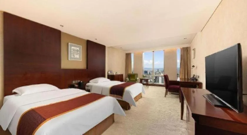 Bed in Shanxi World Trade Hotel