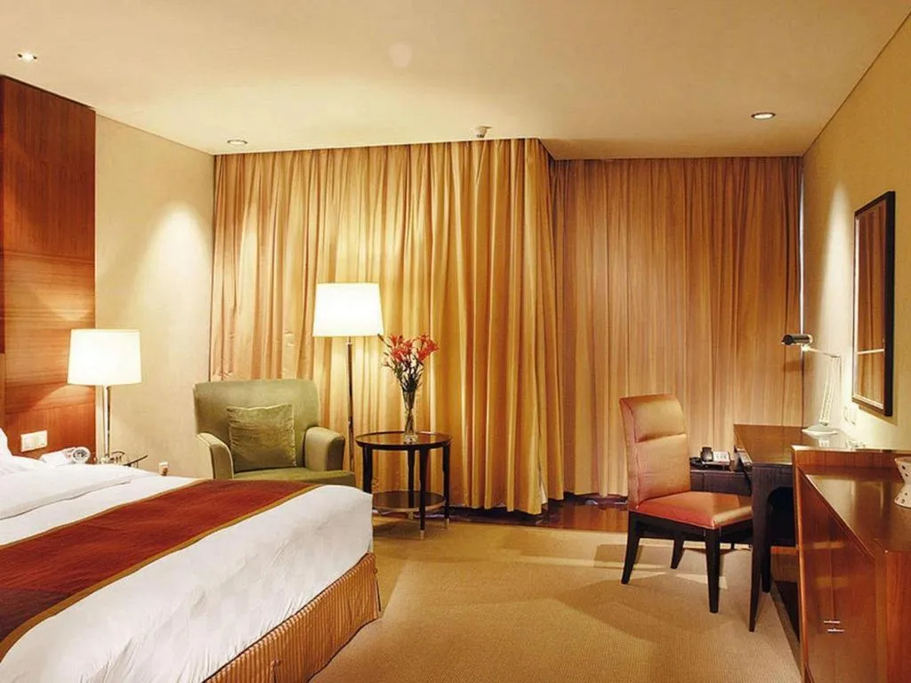 Bed in Shanxi World Trade Hotel