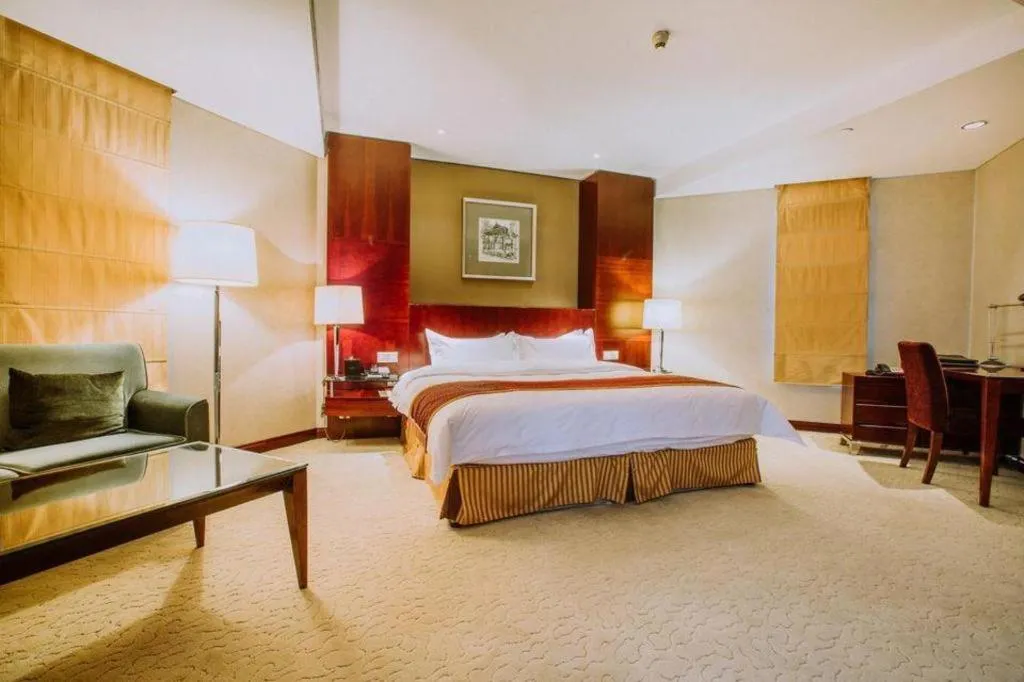 Bed in Shanxi World Trade Hotel