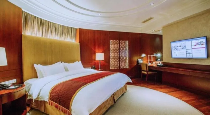 Bed in Shanxi World Trade Hotel
