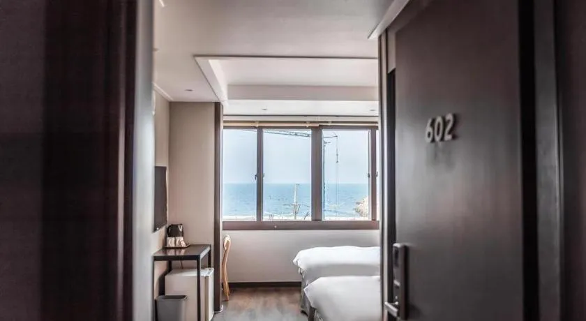 Bed in Check Inn Hotel