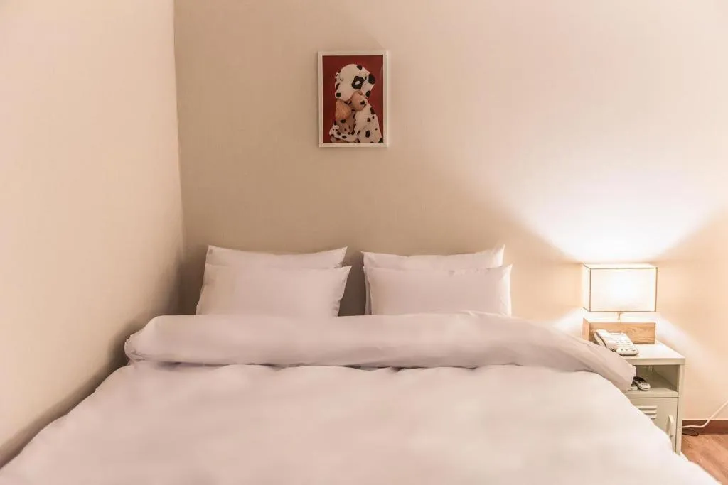 Bed in Check Inn Hotel