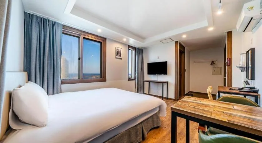 Bed in Check Inn Hotel