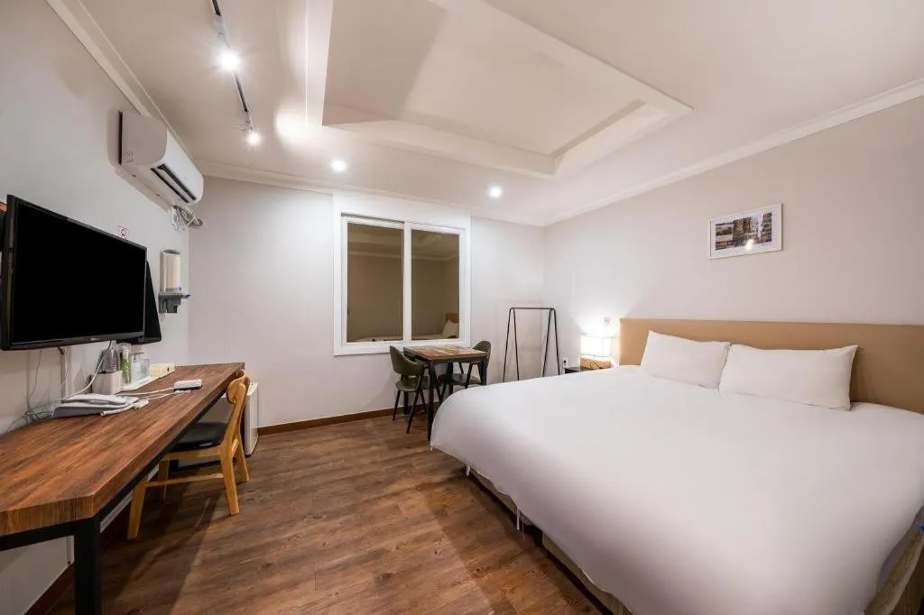 Bed in Check Inn Hotel