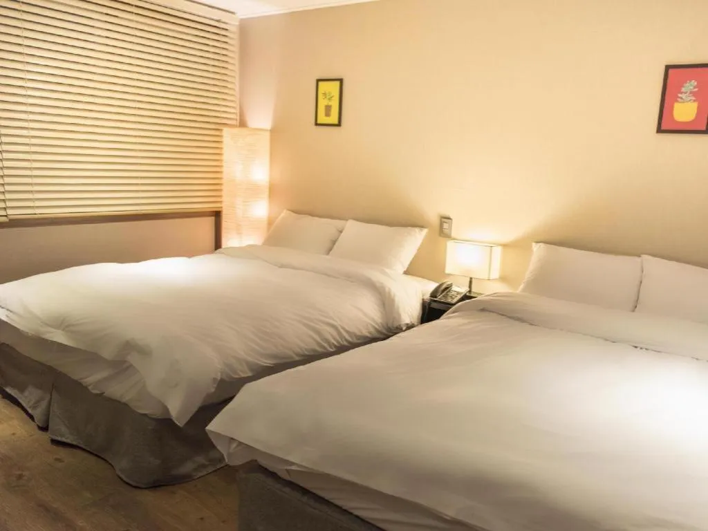 Bed in Check Inn Hotel