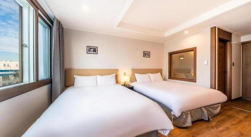 Bed in Check Inn Hotel