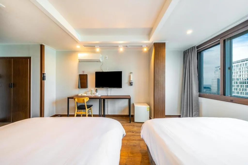 Bed in Check Inn Hotel