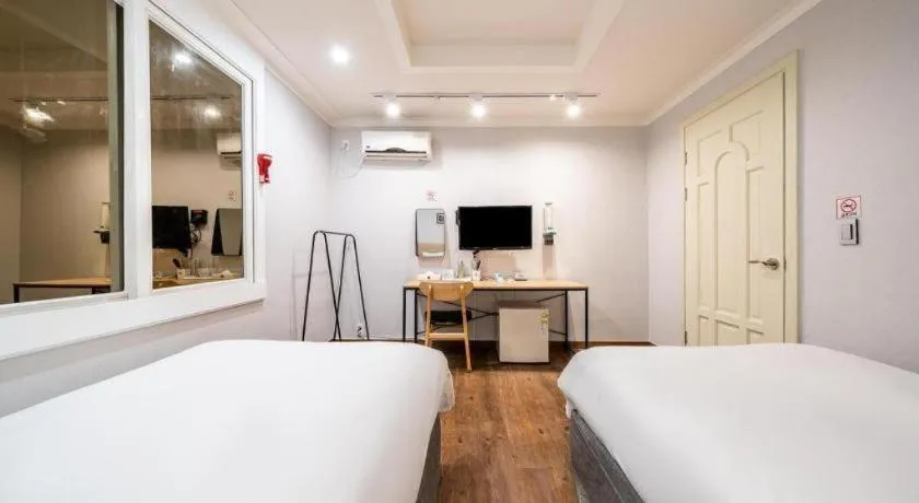 Bed in Check Inn Hotel