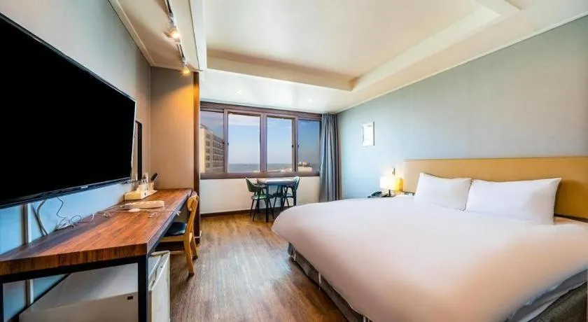 Bed in Check Inn Hotel