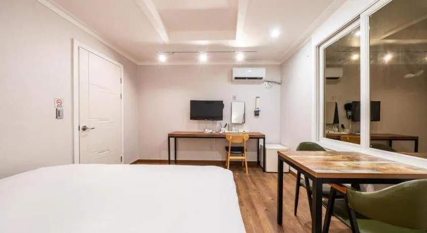 Bed in Check Inn Hotel