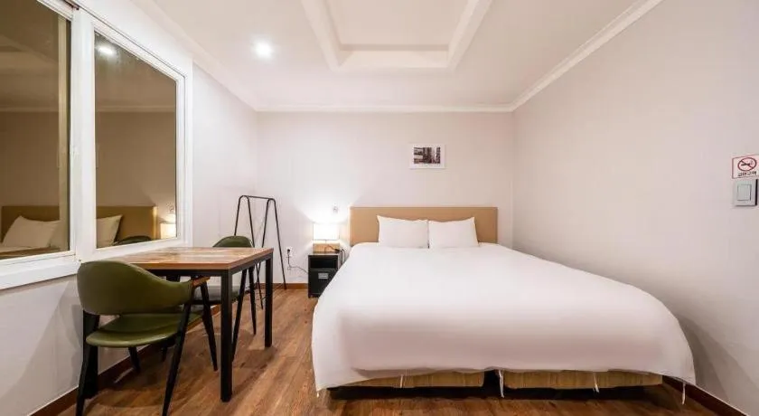 Bed in Check Inn Hotel