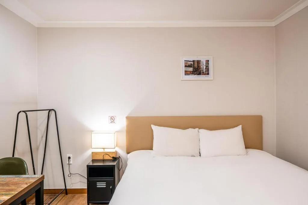 Bed in Check Inn Hotel