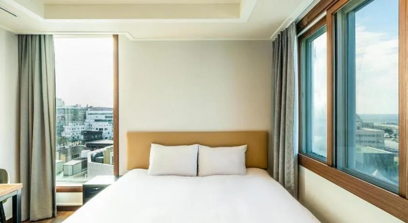 Bed in Check Inn Hotel