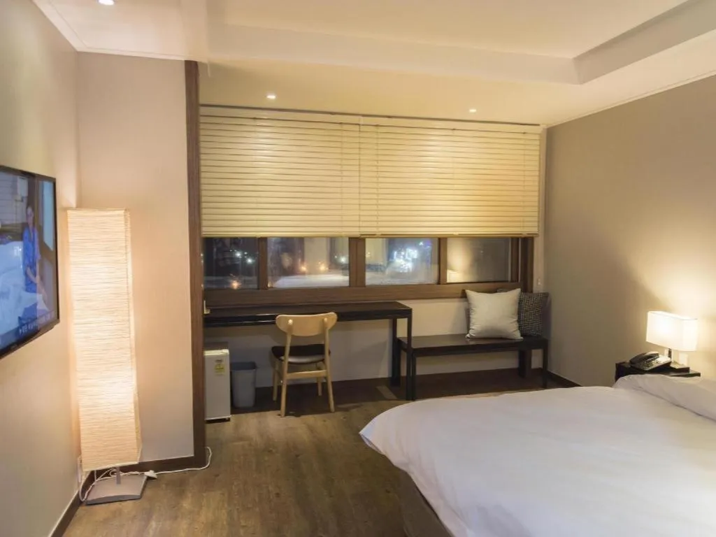 Bed in Check Inn Hotel