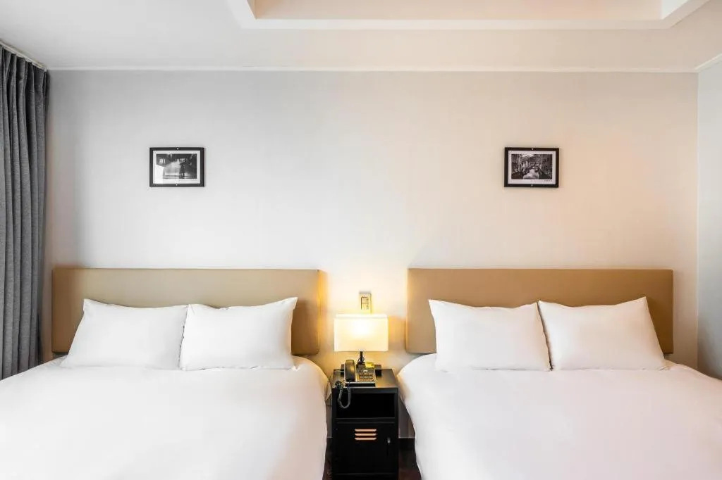 Bed in Check Inn Hotel