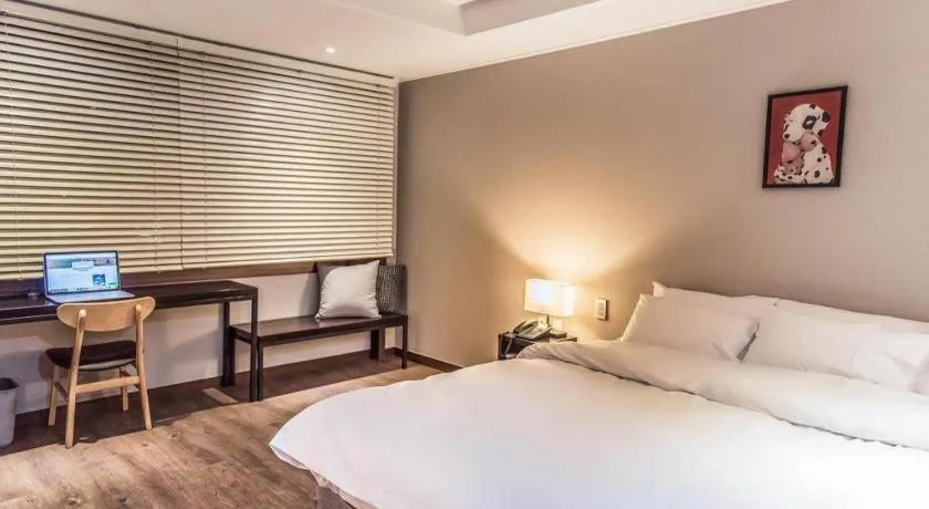 Bed in Check Inn Hotel