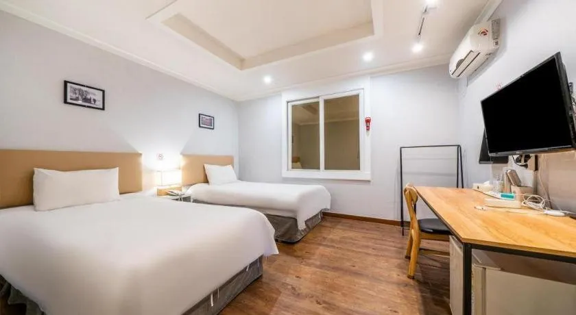 Bed in Check Inn Hotel