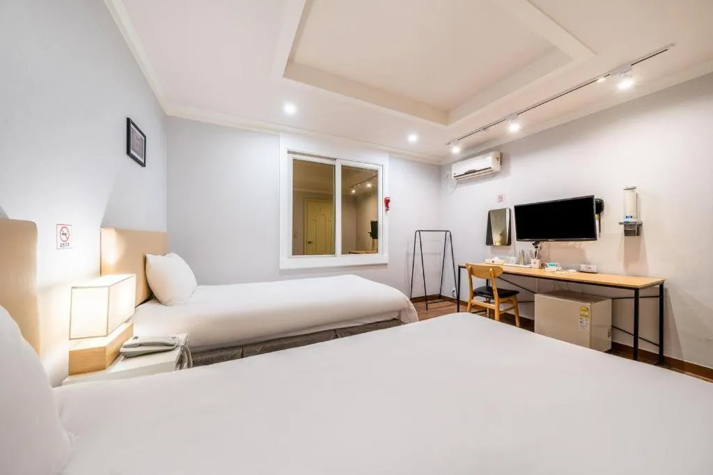 Bed in Check Inn Hotel