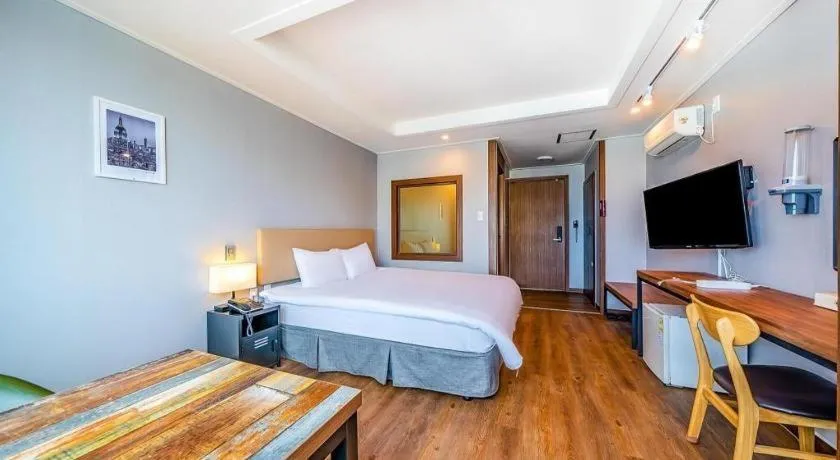 Bed in Check Inn Hotel