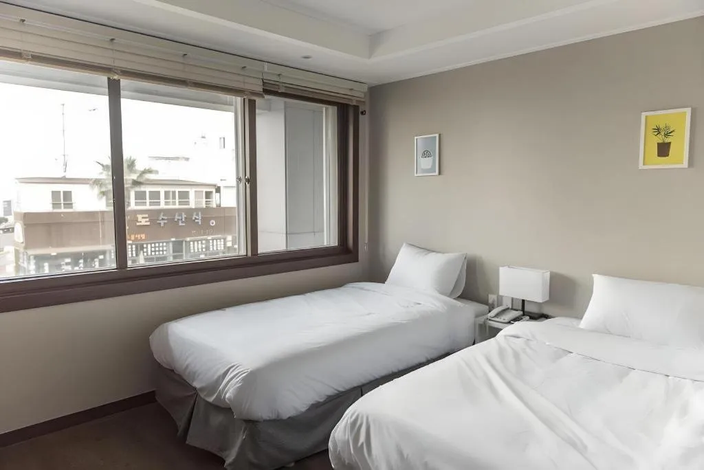 Bed in Check Inn Hotel