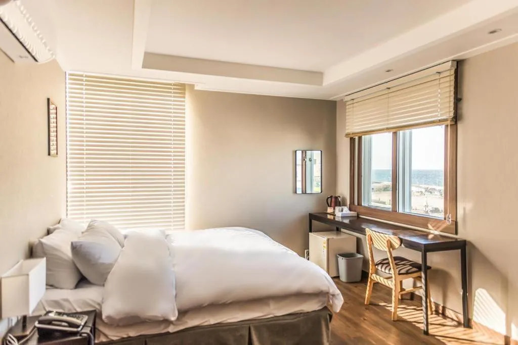 Bed in Check Inn Hotel