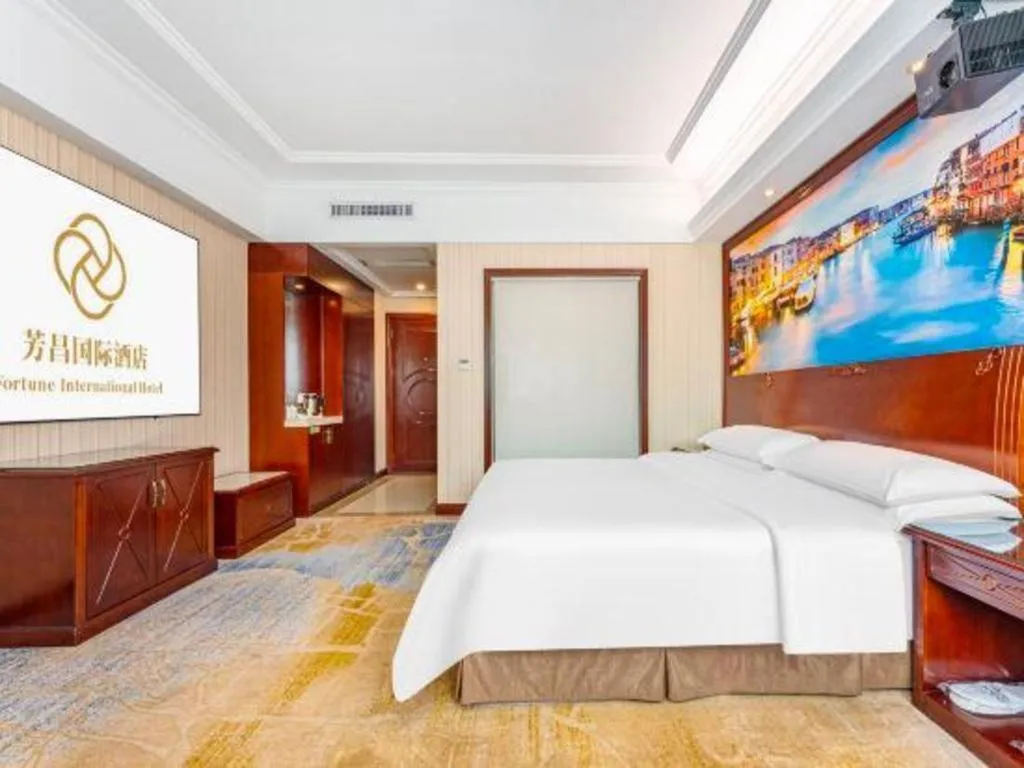 Bed in Vienna International Hotel Guangzhou Tianhe Olympic Stadium Dongpu
