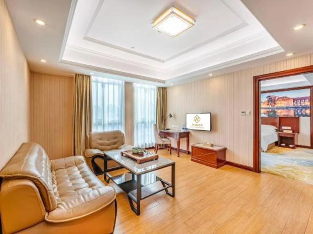 Bed in Vienna International Hotel Guangzhou Tianhe Olympic Stadium Dongpu