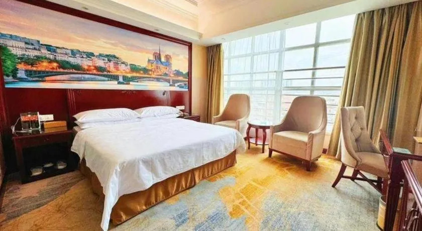 Bed in Vienna International Hotel Guangzhou Tianhe Olympic Stadium Dongpu