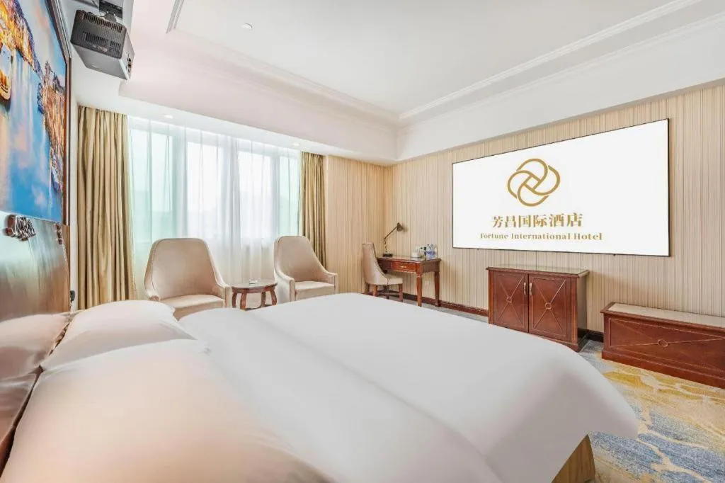 Bed in Vienna International Hotel Guangzhou Tianhe Olympic Stadium Dongpu