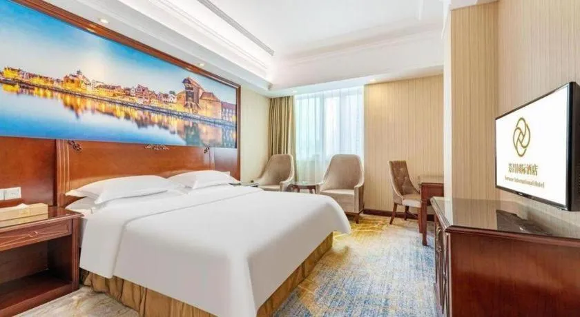 Bed in Vienna International Hotel Guangzhou Tianhe Olympic Stadium Dongpu