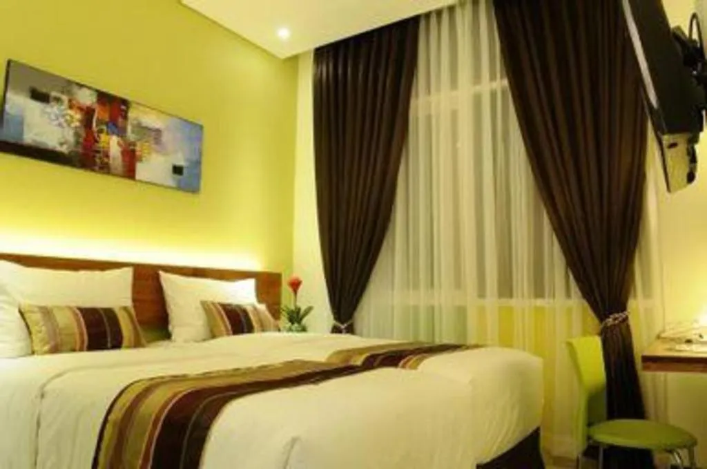 Bed in Biz Boulevard Hotel