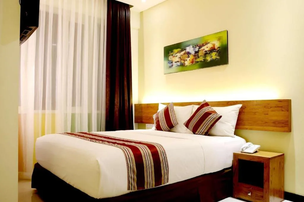 Bed in Biz Boulevard Hotel
