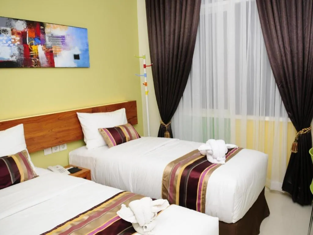 Bed in Biz Boulevard Hotel