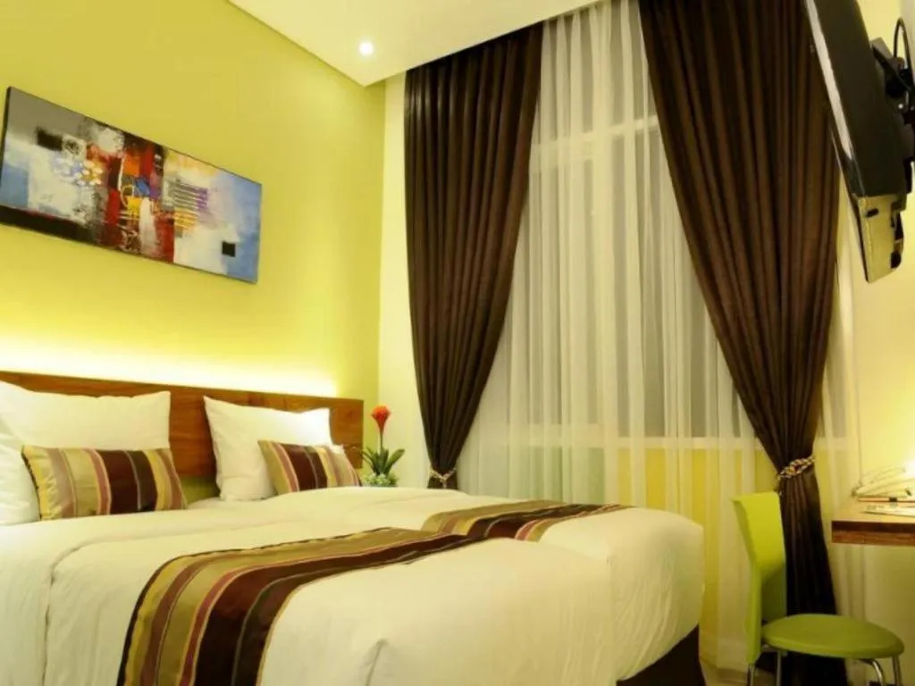 Bed in Biz Boulevard Hotel